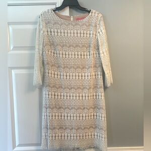 Off white colored dress. Beautiful lace over nude lining
